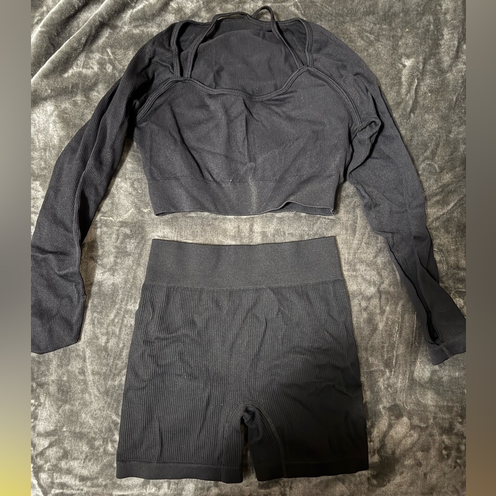 Black gym set (shorts are a MEDIUM but will fit into someone that is a size L)